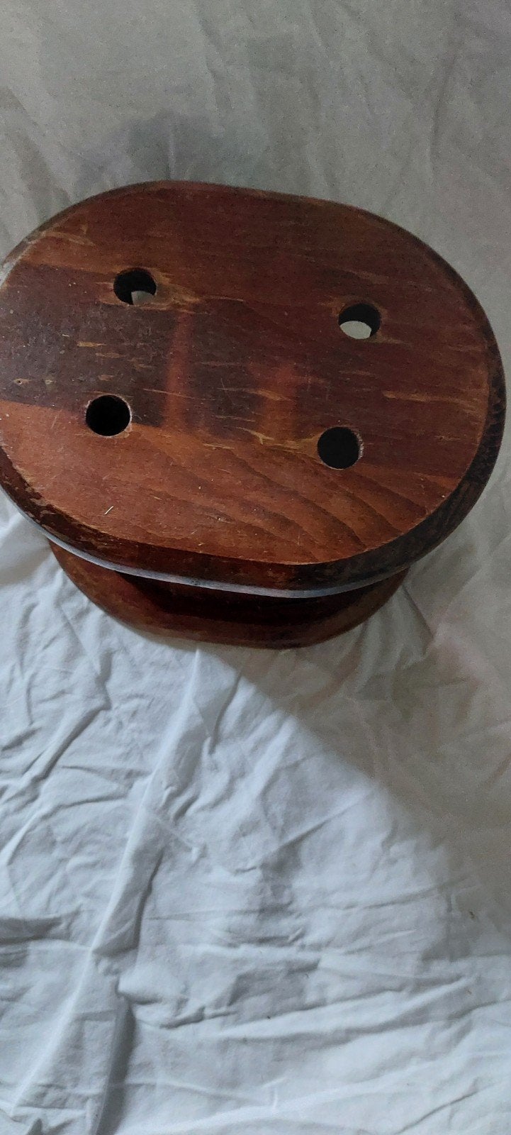 Antieke houten voetenstoof, Ophalen