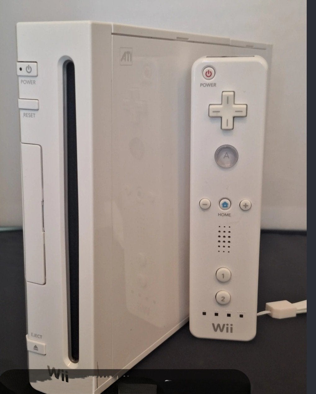 Te koop aangeboden: een witte Nintendo Wii compleet, Ophalen of Verzenden, Gebruikt, Met 2 controllers, Met games