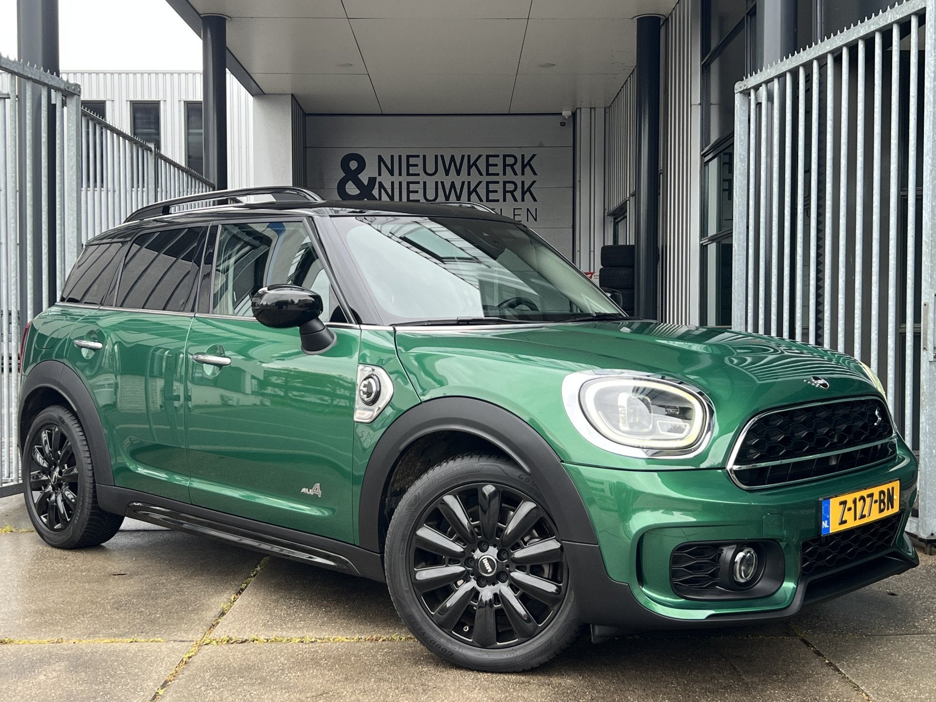 MINI Countryman Mini 1.5 Cooper S E ALL4 JCW Chili | NAVI |, Automaat, Gebruikt, Met garantie (alle), Leder en Stof