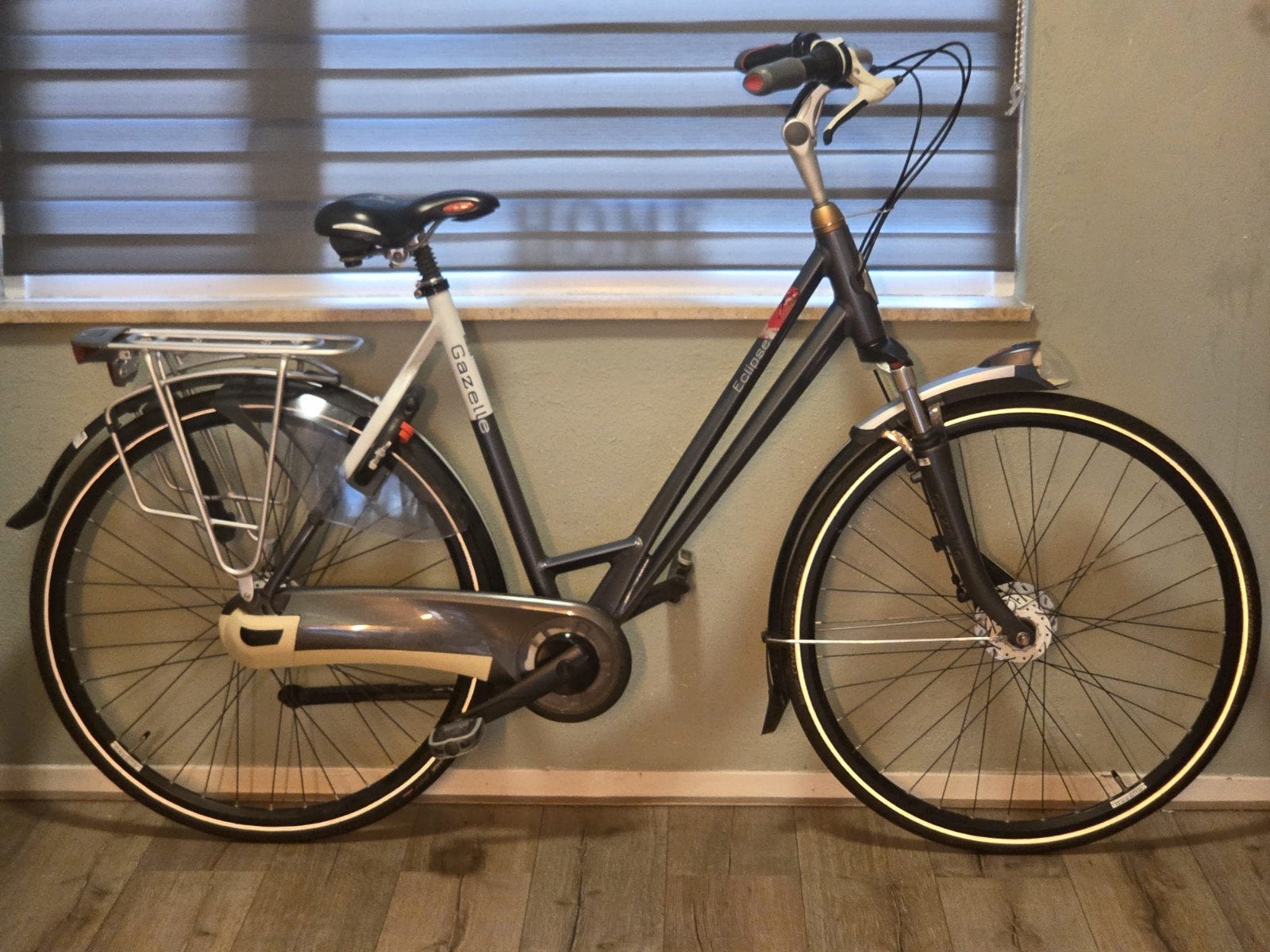 Nette damesfiets gazelle eclipse Framehoogte 57 cm, Ophalen, Gebruikt, Accu, Achterlicht