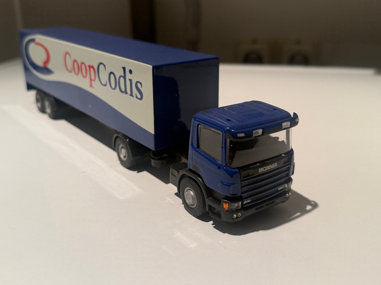 Scania 94D 280 met CoopCodis trailer schaalmodel, Ophalen of Verzenden, Zo goed als nieuw, Overige merken
