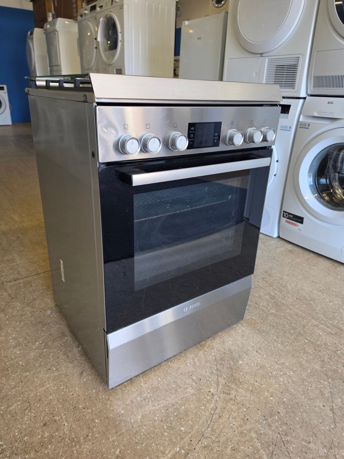 Bosch 4 pits gasfornuis | Rvs | Hete lucht oven | Garantie ✅, Bosch, Jirnsum, 60 cm of meer, Zo goed als nieuw