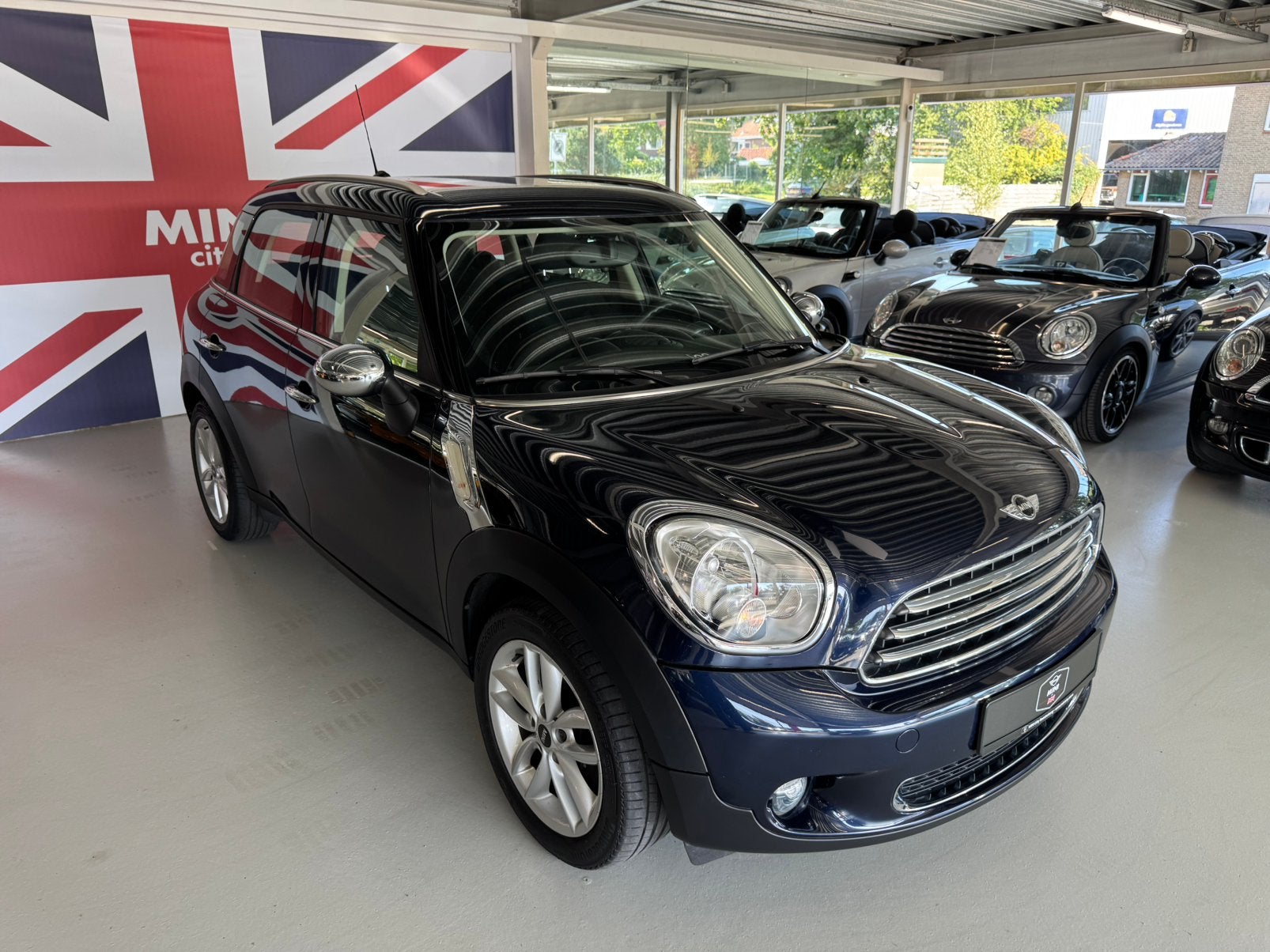 Mini Countryman 1.6 Cooper 2014 Blauw ( 6 MAANDEN GARANTIE ), Auto's, Voorwielaandrijving, Stof, Zwart, Blauw
