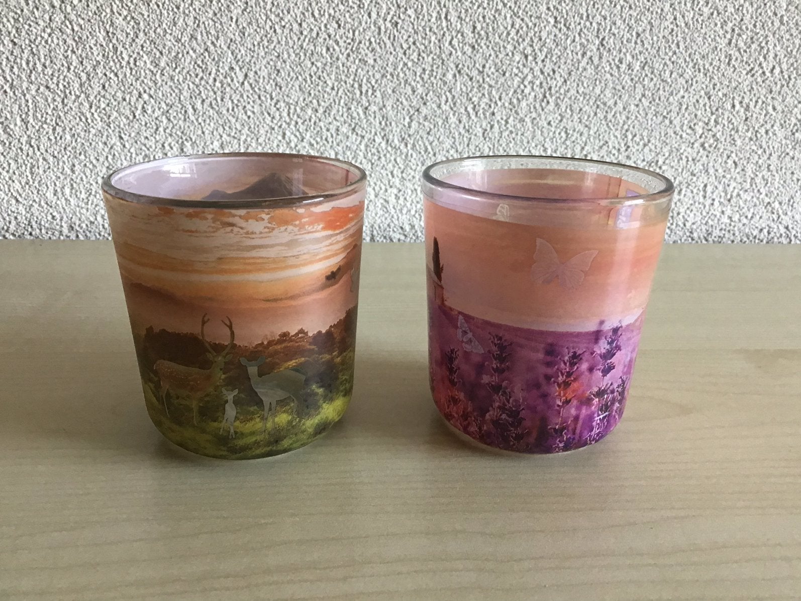 Twee gedecoreerde glazen. Merk Bolsius. Hoogte 8 cm., Gebruikt, Verzenden, Waxinelichthouder, Glas