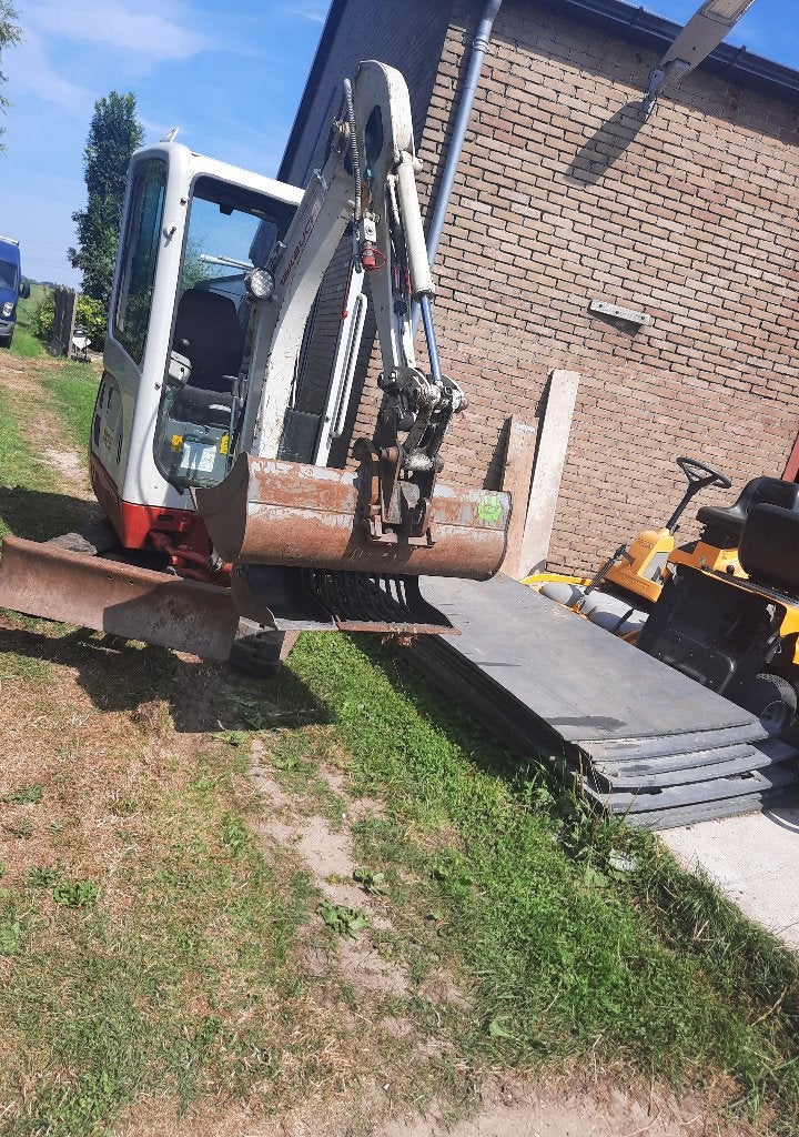Kunststof rijplaten en kraantje/minigraver te huur, Ophalen