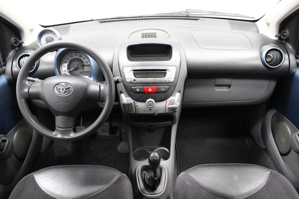 Toyota Aygo 1.0-12V Dynamic Blue | Airco | Half leer | Sport, Auto's, Voorwielaandrijving, Gebruikt, 68 pk, Bedrijf