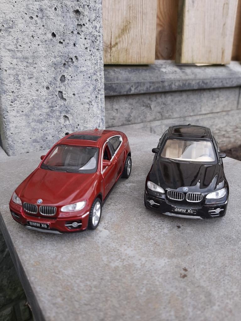 BMW X6 E71 MODELAUTO ZWART/ROOD, Hobby en Vrije tijd, Modelauto's | 1:43, Ophalen of Verzenden, Auto, Overige merken