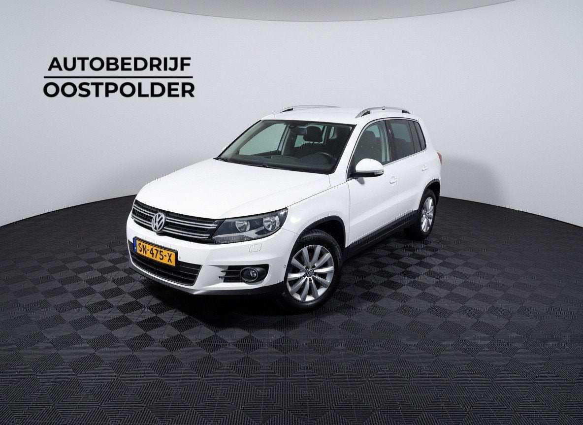 Volkswagen Tiguan 1.4 TSI Sport&Style 4Motion, Auto's, 13 km/l, Gebruikt, Zwart, 4 cilinders