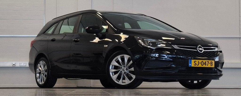Opel Astra Sports Tourer 1.0T Innovation Navigatie Garantie, Auto's, Opel, Voorwielaandrijving, Stof, Gebruikt, 1178 kg