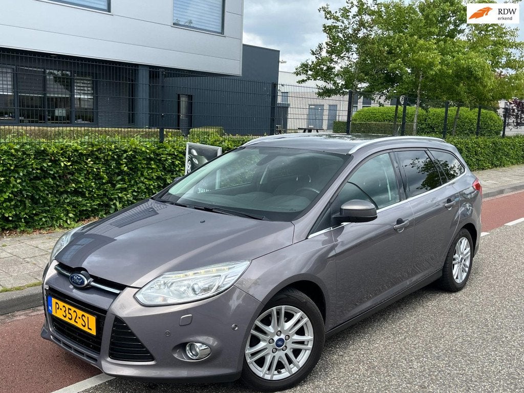 Ford Focus Wagon 1.0 EcoBoost Titanium Cruise/Climate-contro, Auto's, Ford, Euro 5, 125 pk, Zwart, Bruin