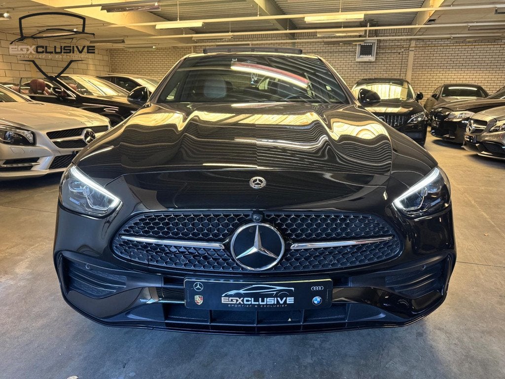 Mercedes-Benz C-klasse 180 AMG Line Pano/Ambiente/Camera, Auto's, Mercedes-Benz, Automaat, 4 cilinders, Zwart, Leder