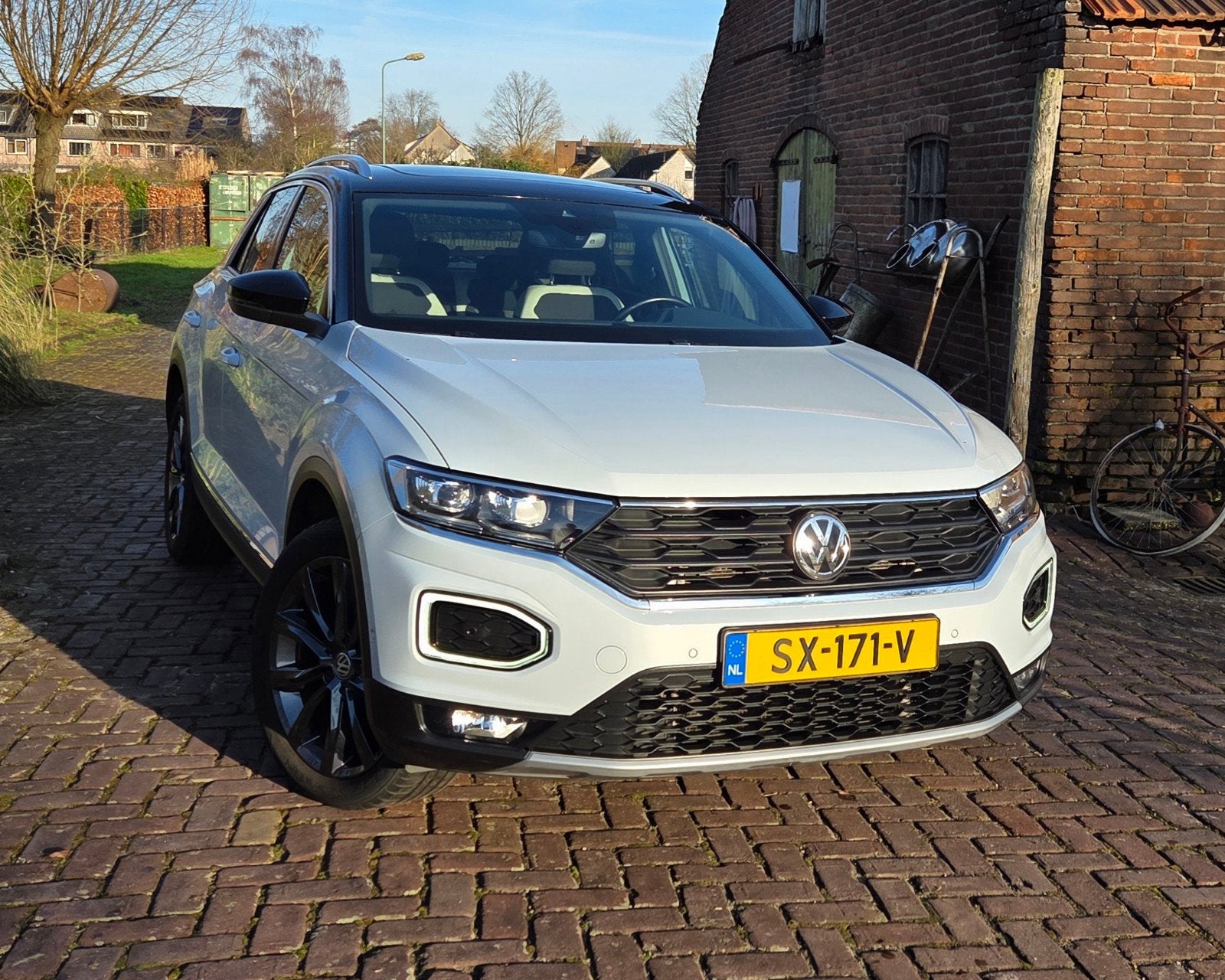 Volkswagen T-Roc 2.0 TSI 4Motion Sport DSG PANO TREKHAAK, Automaat, 1984 cc, Leder en Stof, Wit