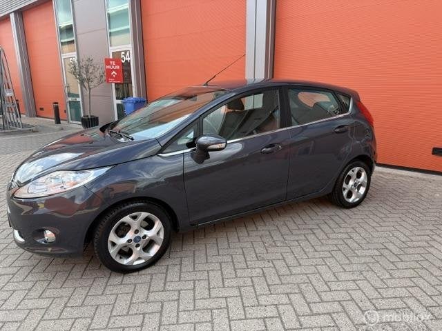 Ford Fiesta 1.25 Titanium 5 DRS -KM NAP-AIRCO-LM -APK, Auto's, Voorwielaandrijving, Stof, 1242 cc, 82 pk