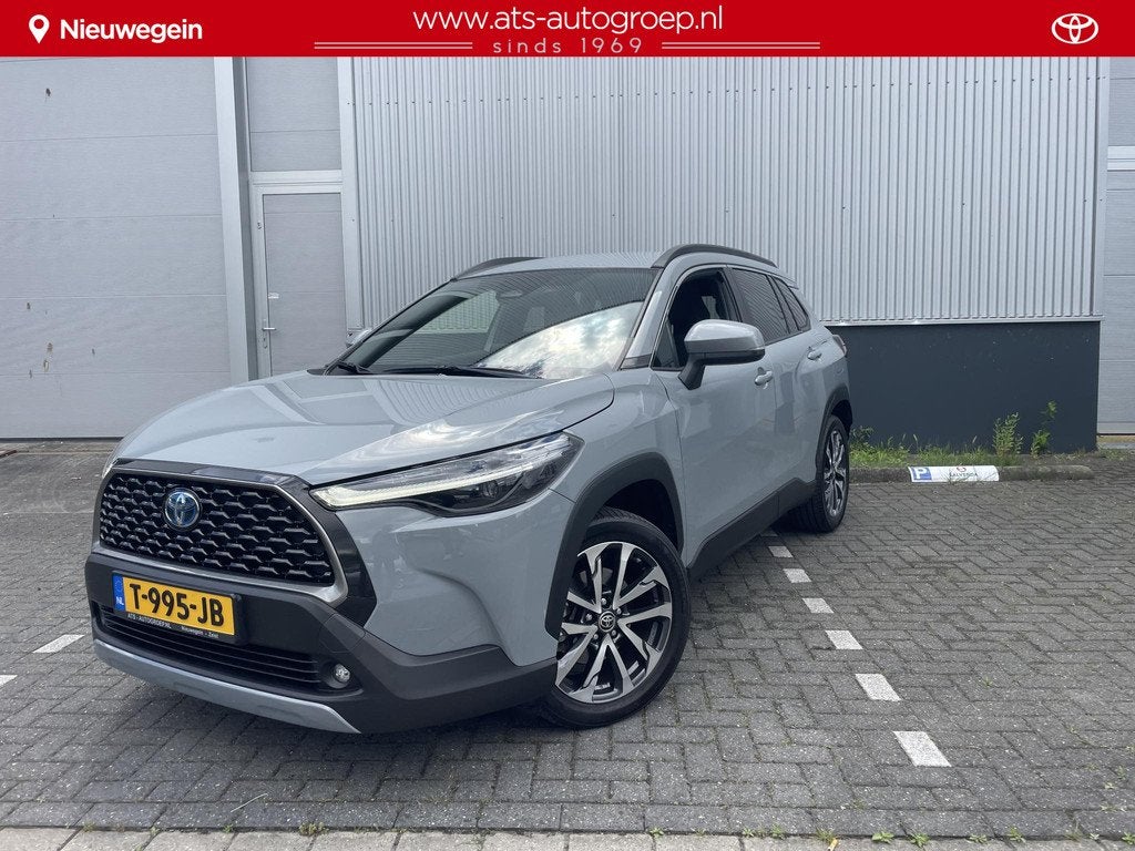 Toyota Corolla Cross Hybrid 140 Dynamic | Navigatie | Origin, Auto's, Stof, Gebruikt, 4 cilinders, Origineel Nederlands