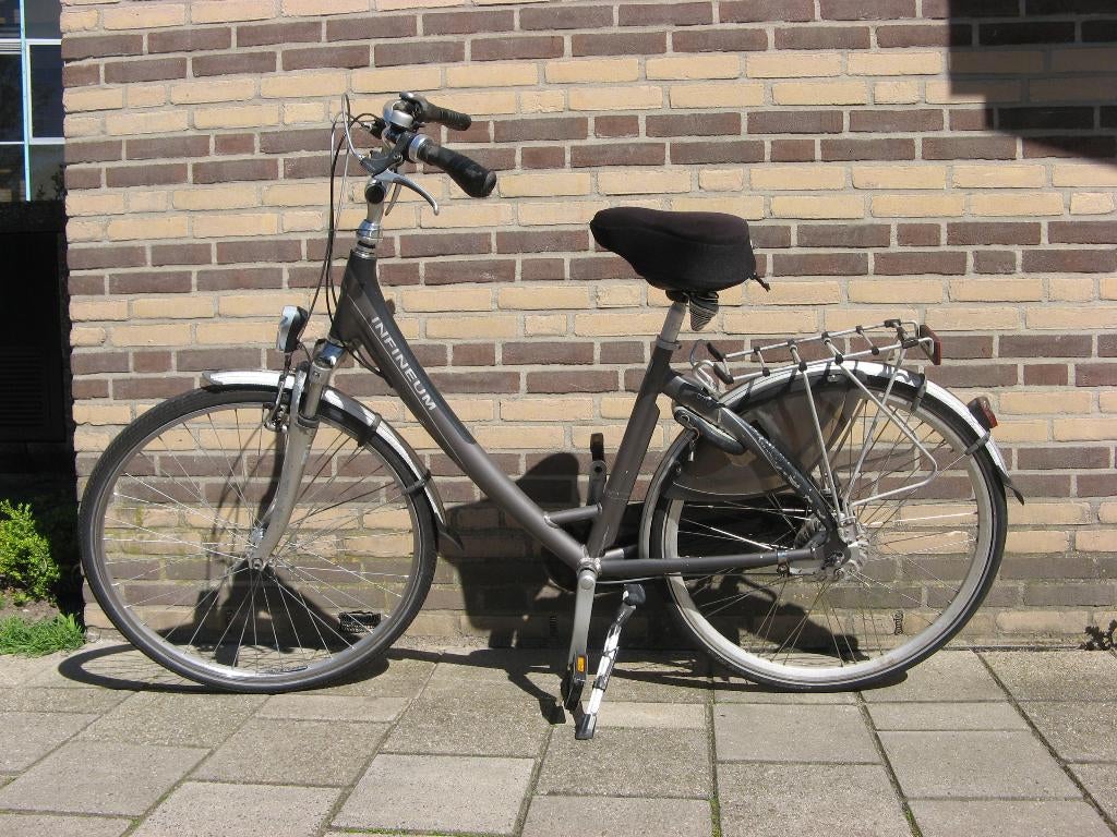 Damesfiets Infineum 8 versnellingen, Fietsen en Brommers, Gebruikt, Velgrem, Versnellingen, 56 cm of meer