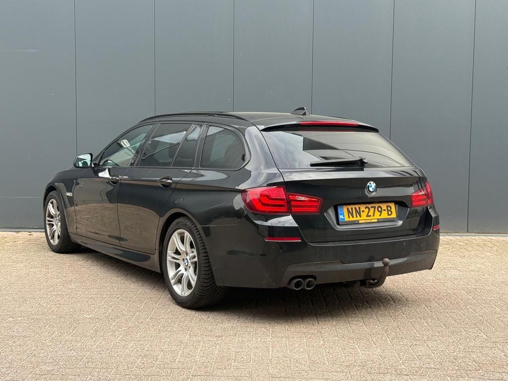 BMW 5-serie Touring 520d High Executive M Sportpakket, 184PK, Auto's, BMW, Automaat, Achterwielaandrijving, Zwart, 2000 kg