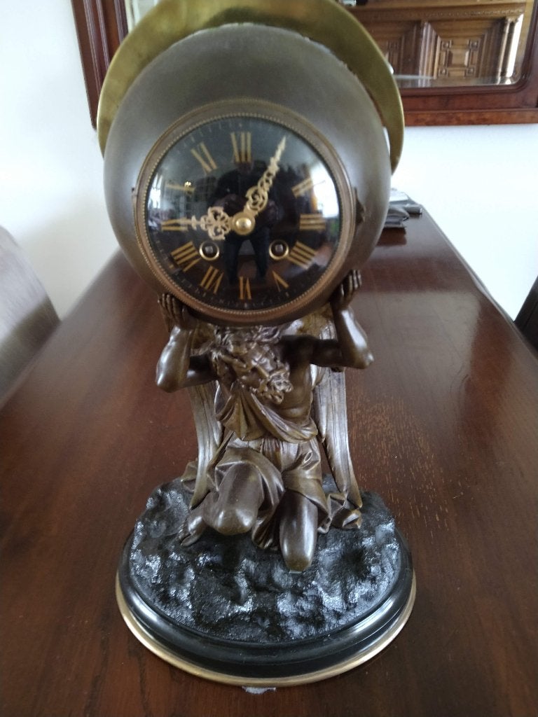 Pendule Chronos (God van de tijd), Ophalen