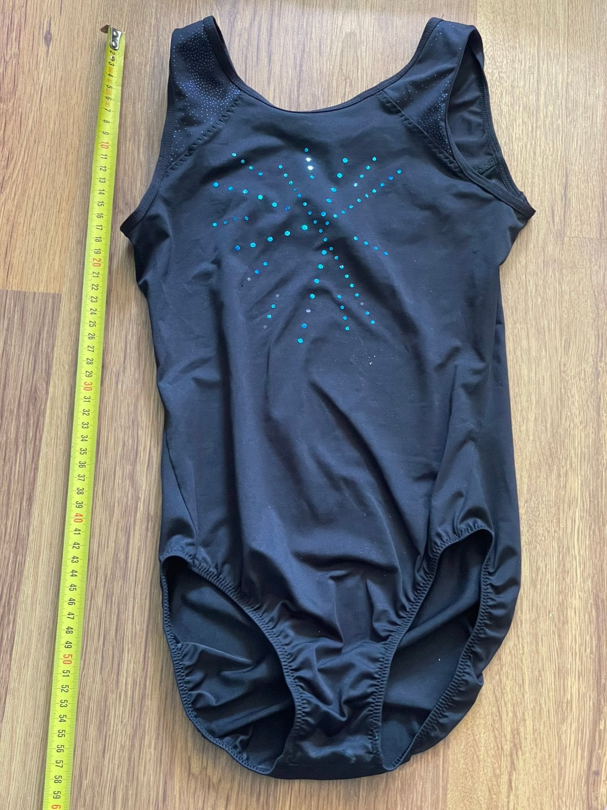 Turnpakje meisje zwart met blauwe glitterster, Ophalen, Gebruikt, Zwart, Kindermaat 122 t/m 140