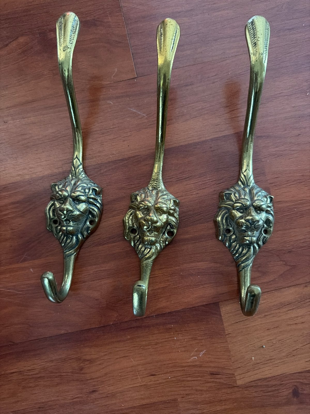 Set van 3 vintage messing leeuwenkop wandhaken, Gebruikt, Wandhaken, Ophalen of Verzenden, Minder dan 100 cm