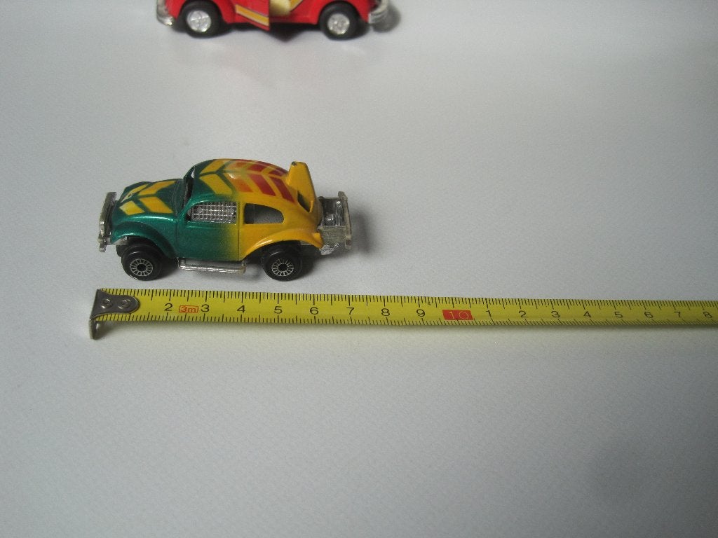 Vintage speelgoed autootje Volkswagen Kever "stuntcar" 7 cm., Verzamelen, Ophalen of Verzenden, Zo goed als nieuw