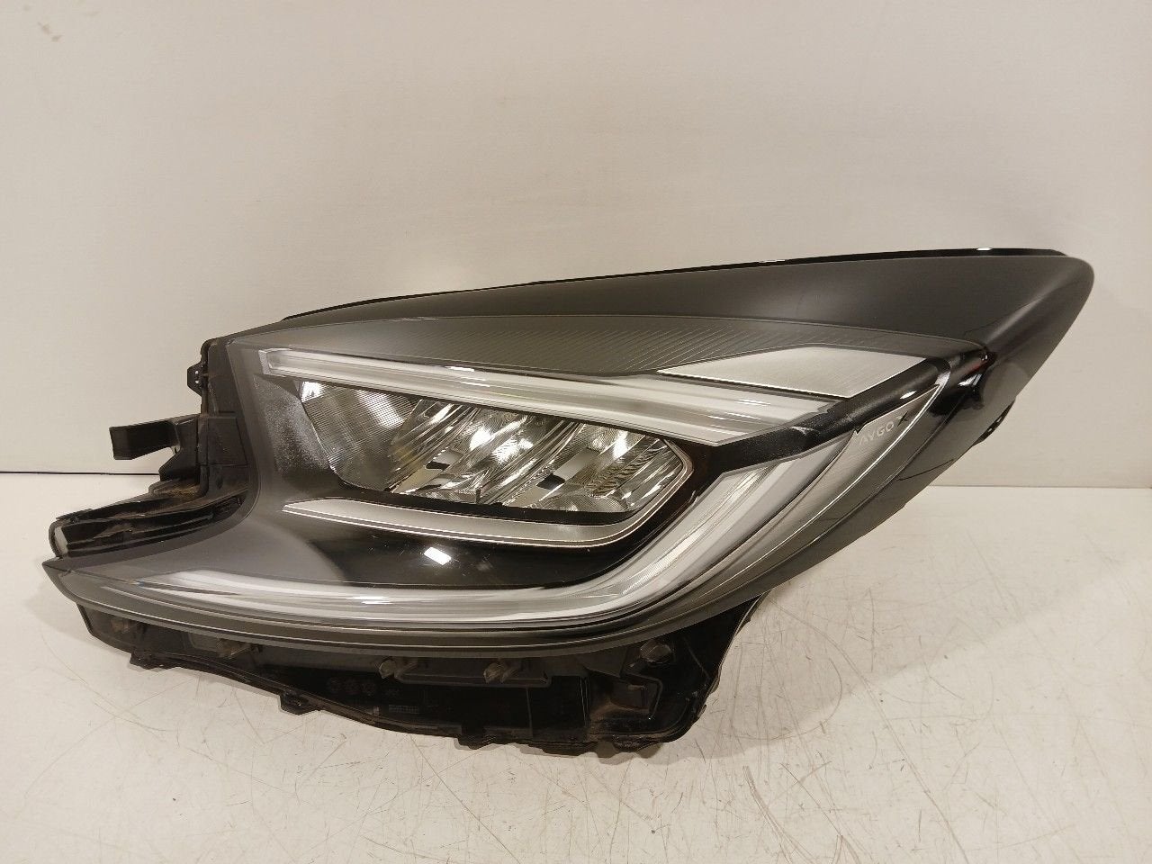 Koplamp links Toyota Aygo, Auto-onderdelen, Verlichting, Toyota, Gebruikt, Herkomst onderdeel bekend, 12 maanden garantie, Ophalen of Verzenden