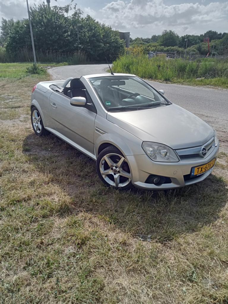 Opel Tigra 1.8 16V Twintop 2009 Grijs, Auto's, Opel, 125 pk, 4 cilinders, 1796 cc, Handgeschakeld