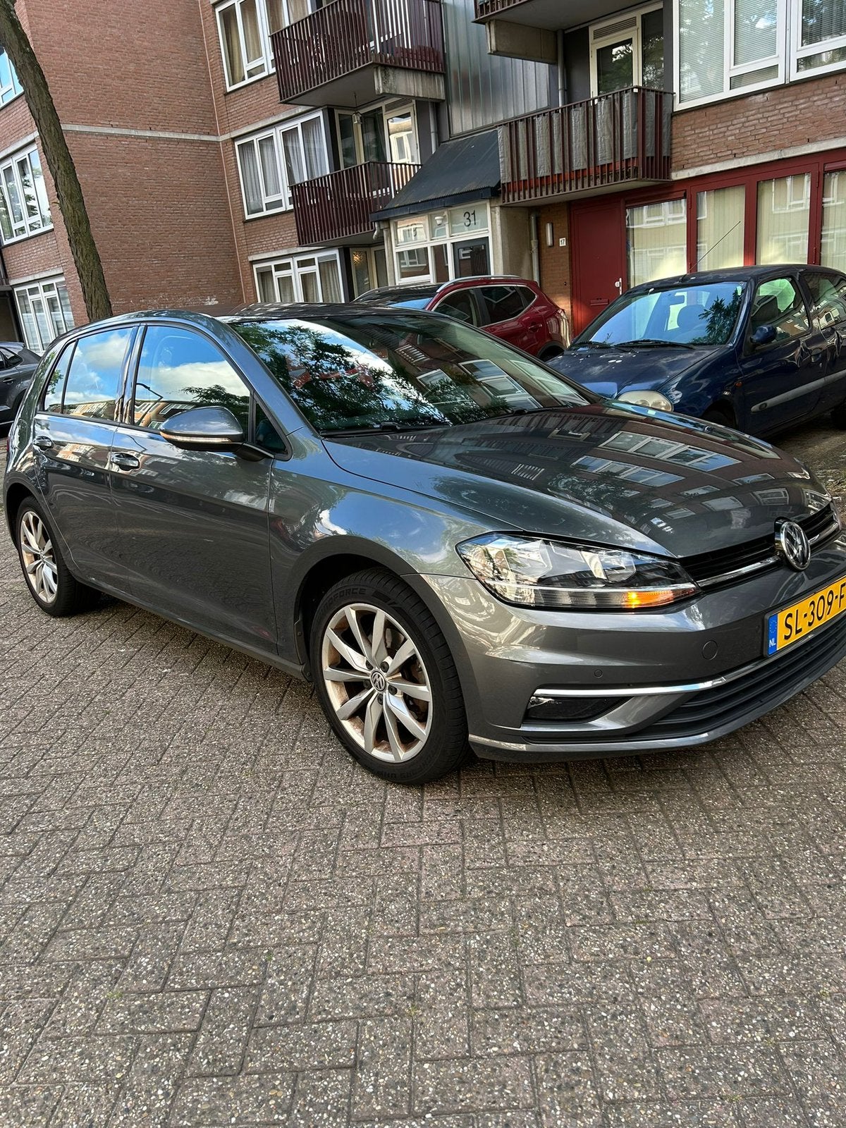 Volkswagen Golf 1.5 TSI 150pk 5D 2018 Grijs, Auto's, Voorwielaandrijving, 1498 cc, 4 cilinders, Origineel Nederlands
