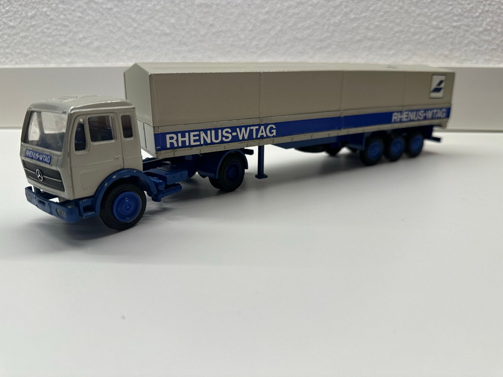 NZG Mercedes Benz NG Trekker met oplegger Rhenus-Wtag, Hobby en Vrije tijd, Ophalen of Verzenden, Gebruikt, Bus of Vrachtwagen