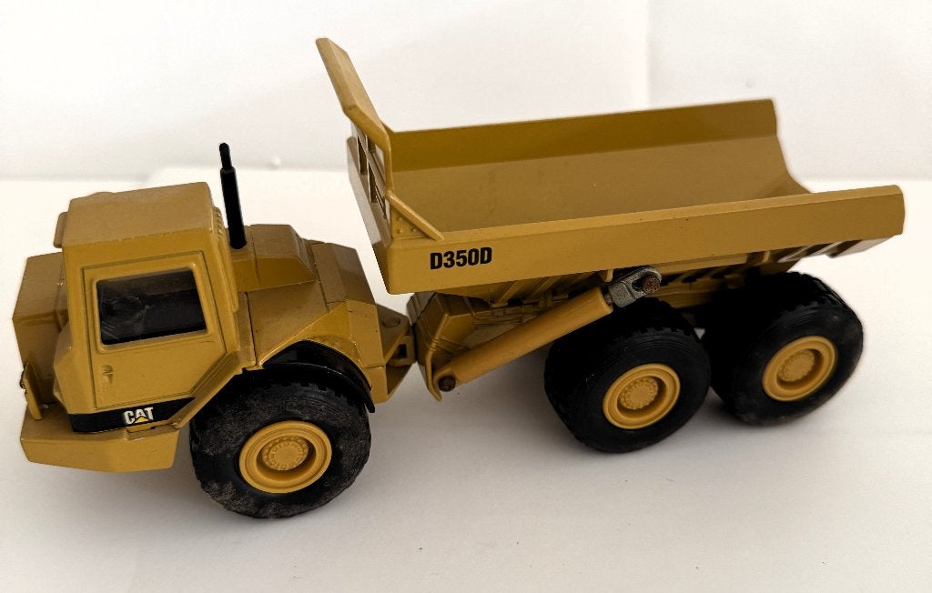 ERTL Caterpillar D350D Articulated DumpTruck S 1.50 (NR R), Ophalen, Zo goed als nieuw, Bus of Vrachtwagen, Overige merken
