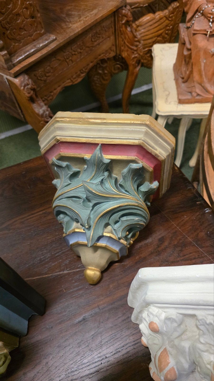 Drie antieke wandconsoles, Ophalen