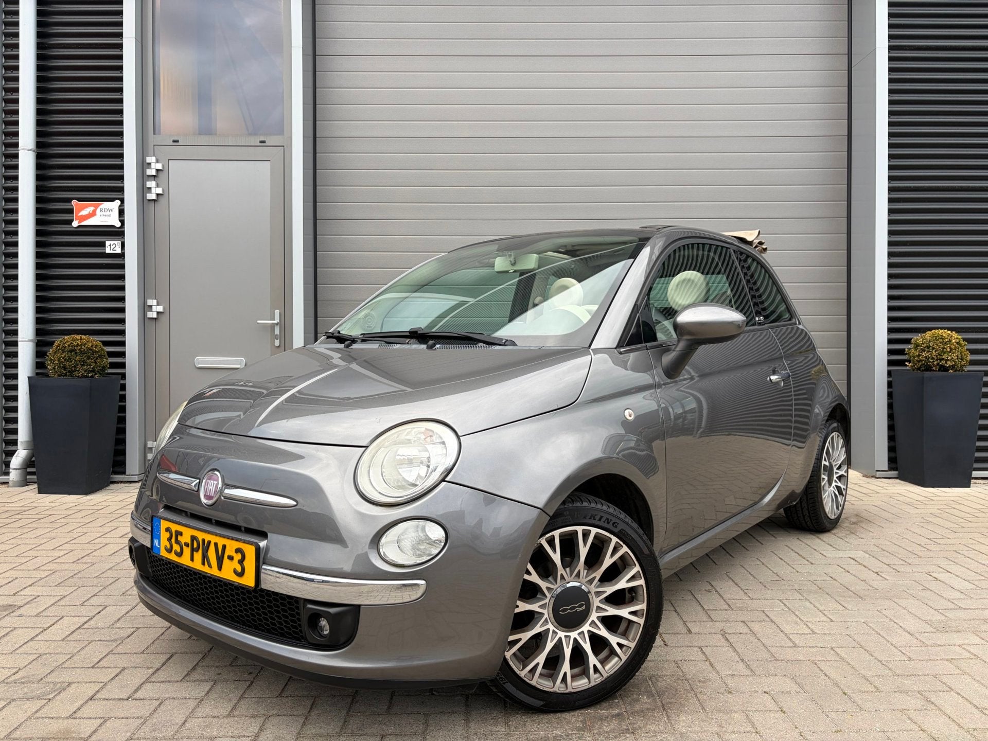 Fiat 500 1.2 Lounge/Automaat/Cabrio/Airco/Lichtmetaal/, Auto's, Euro 5, Gebruikt, 4 cilinders, Cabriolet