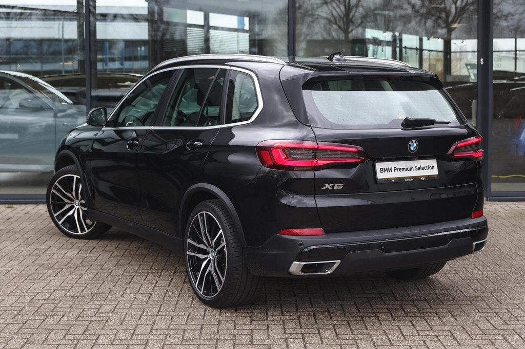 BMW X5 xDrive45e Executive Automaat 22 inch Sportstoelen / A, Gebruikt, 394 pk, Met garantie (alle), Zwart