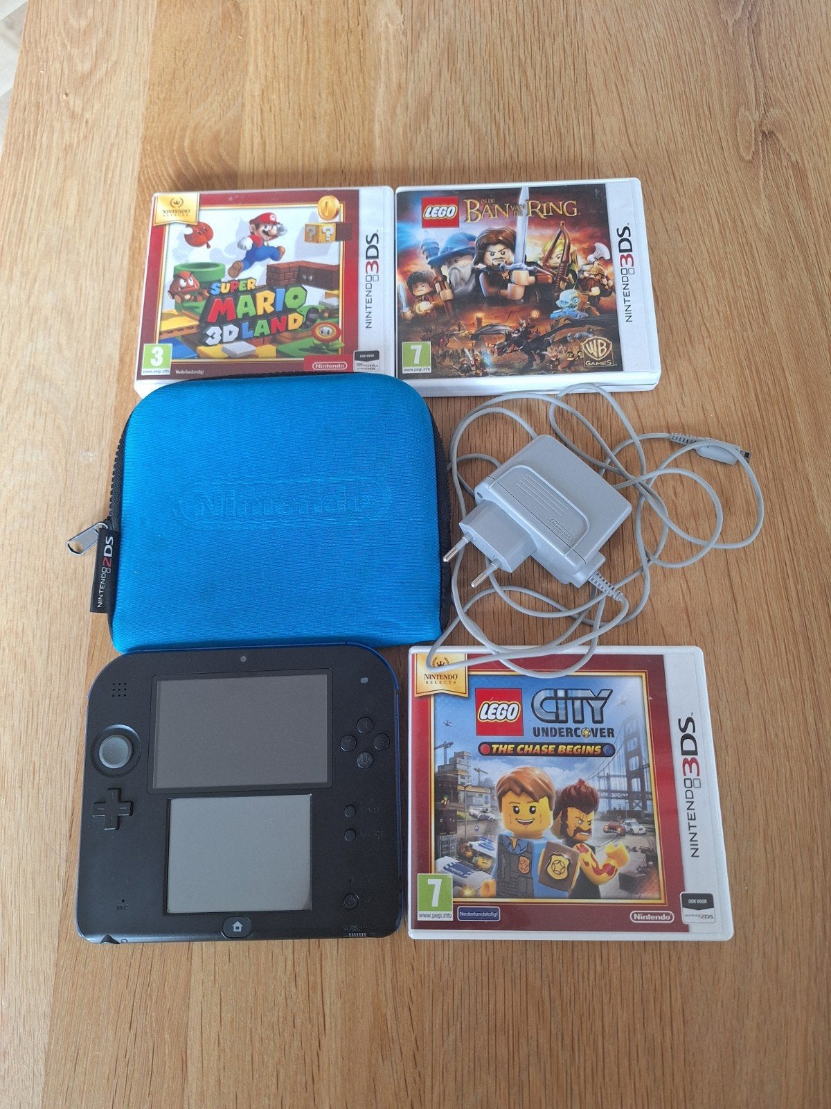 Nintendo 2DS compleet met 3 spellen, lader en opbergmap, Ophalen, Blauw, 2DS