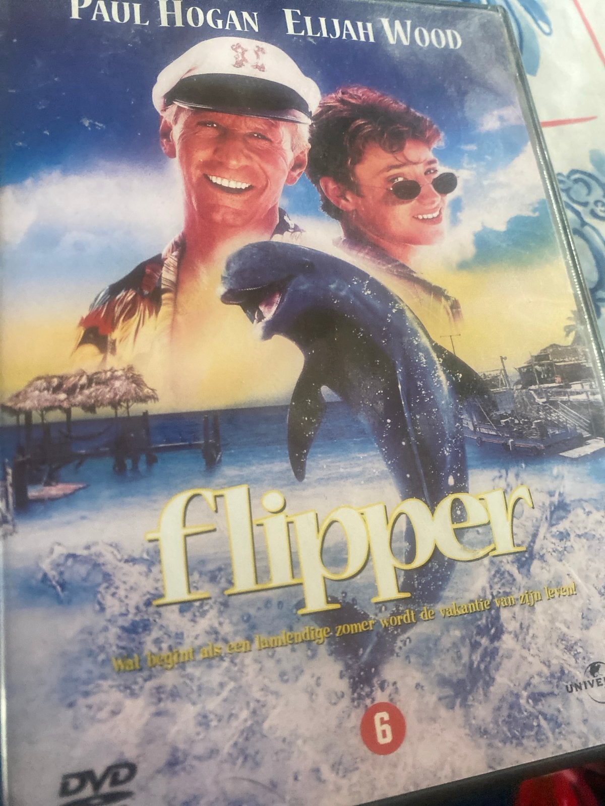 Flipper DVD - Familiefilm met Paul Hogan & Elijah Wood, Vanaf 6 jaar, Ophalen of Verzenden, Zo goed als nieuw