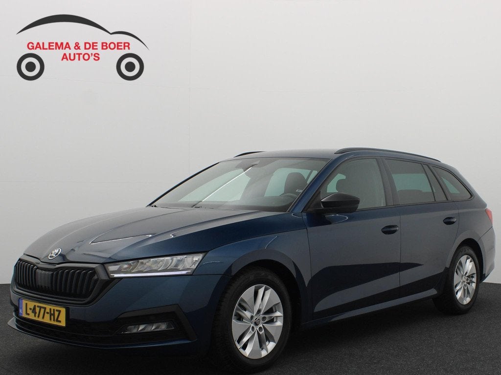 Skoda Octavia Combi 1.0 e-TSI Sport Business AUTOMAAT / SFEE, Auto's, Stof, Gebruikt, Euro 6, Blauw
