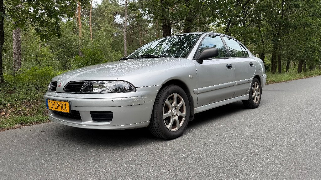 Mitsubishi Carisma 1.6 EXE 2003 *AIRCO*LAGE KM*BENZINE*, Voorwielaandrijving, Stof, 4 cilinders, Grijs