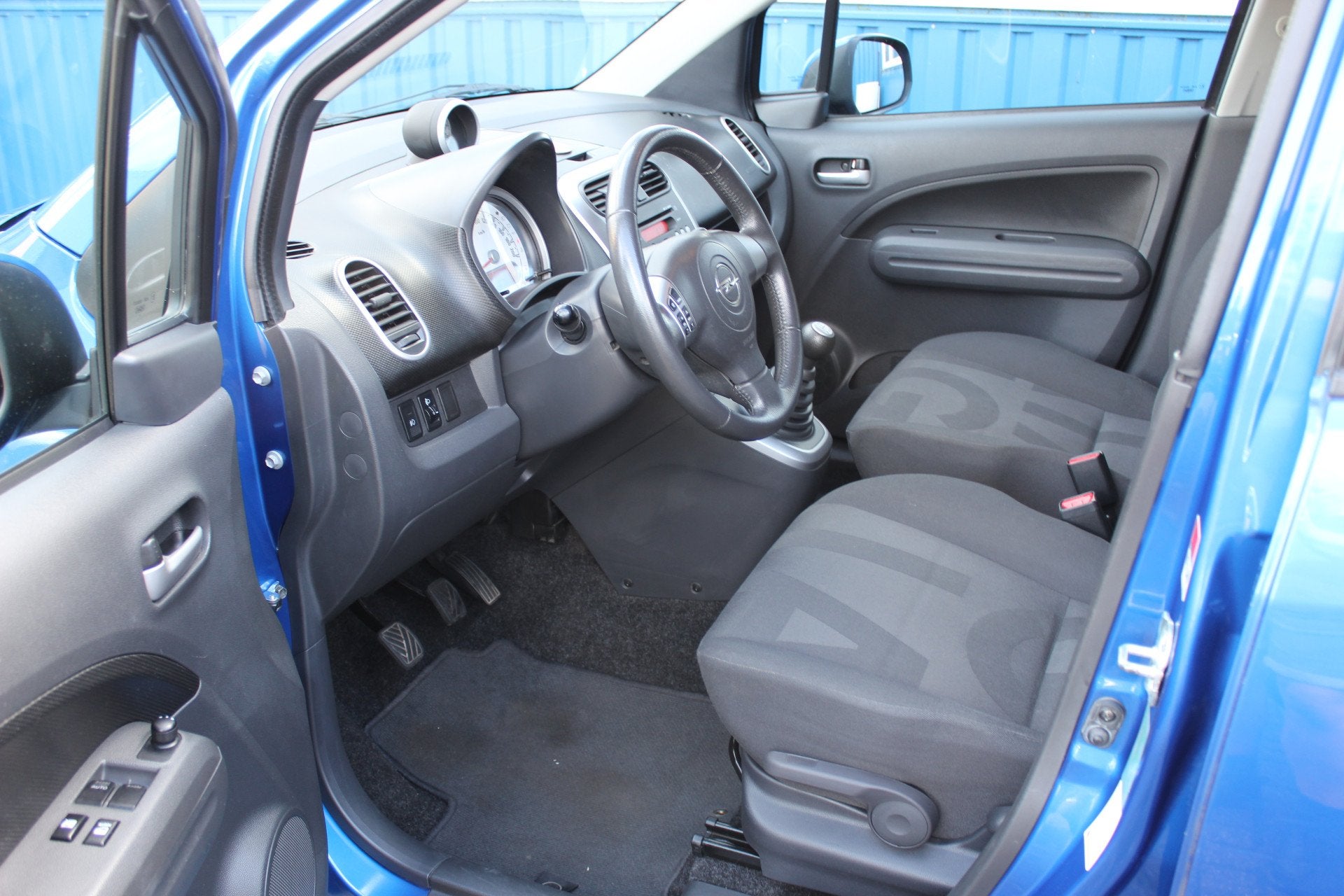 Opel Agila 1.0"Edition" Airco - Hoge instap (bj 2010), Auto's, Voorwielaandrijving, Elektrische ramen, Stof, Gebruikt