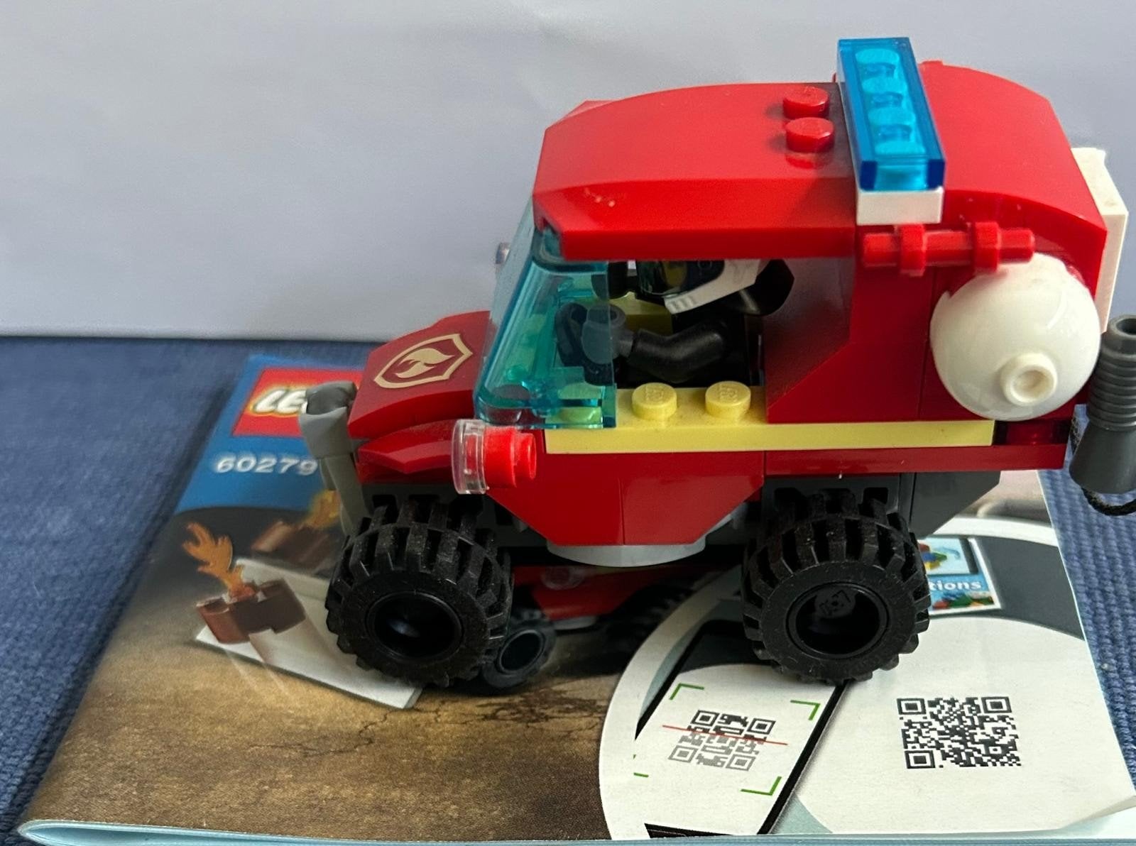 LEGO City Brandweer terreinwagen 60279, Ophalen