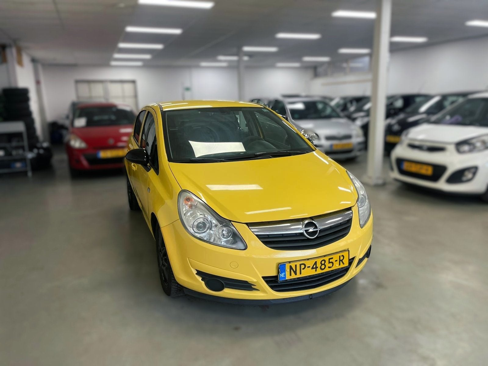 Opel Corsa 1.4-16V Business Sport, Auto's, Voorwielaandrijving, Stoelverwarming, 1063 kg, Gebruikt
