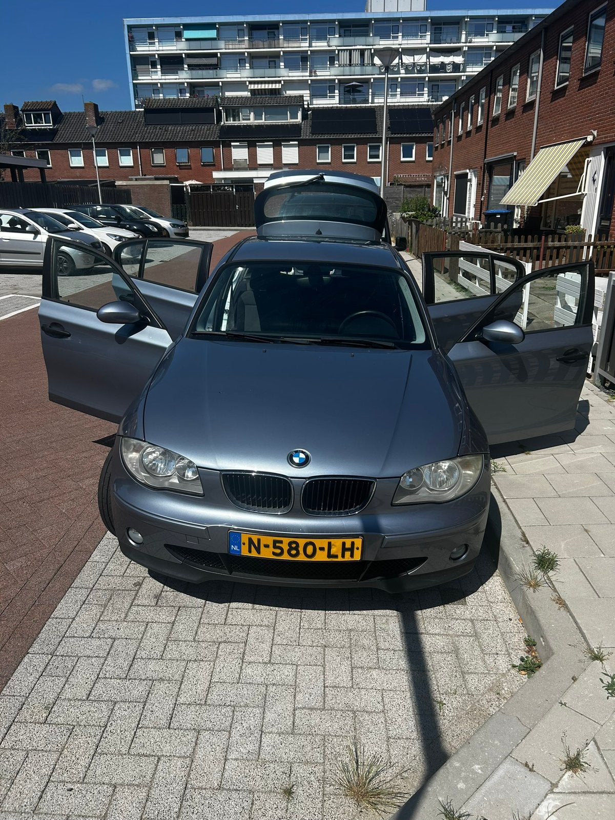 BMW 1-Serie 2.0 118I AUT 2006 Grijs, Auto's, BMW, 1995 cc, 4 cilinders, 129 pk, 1200 kg