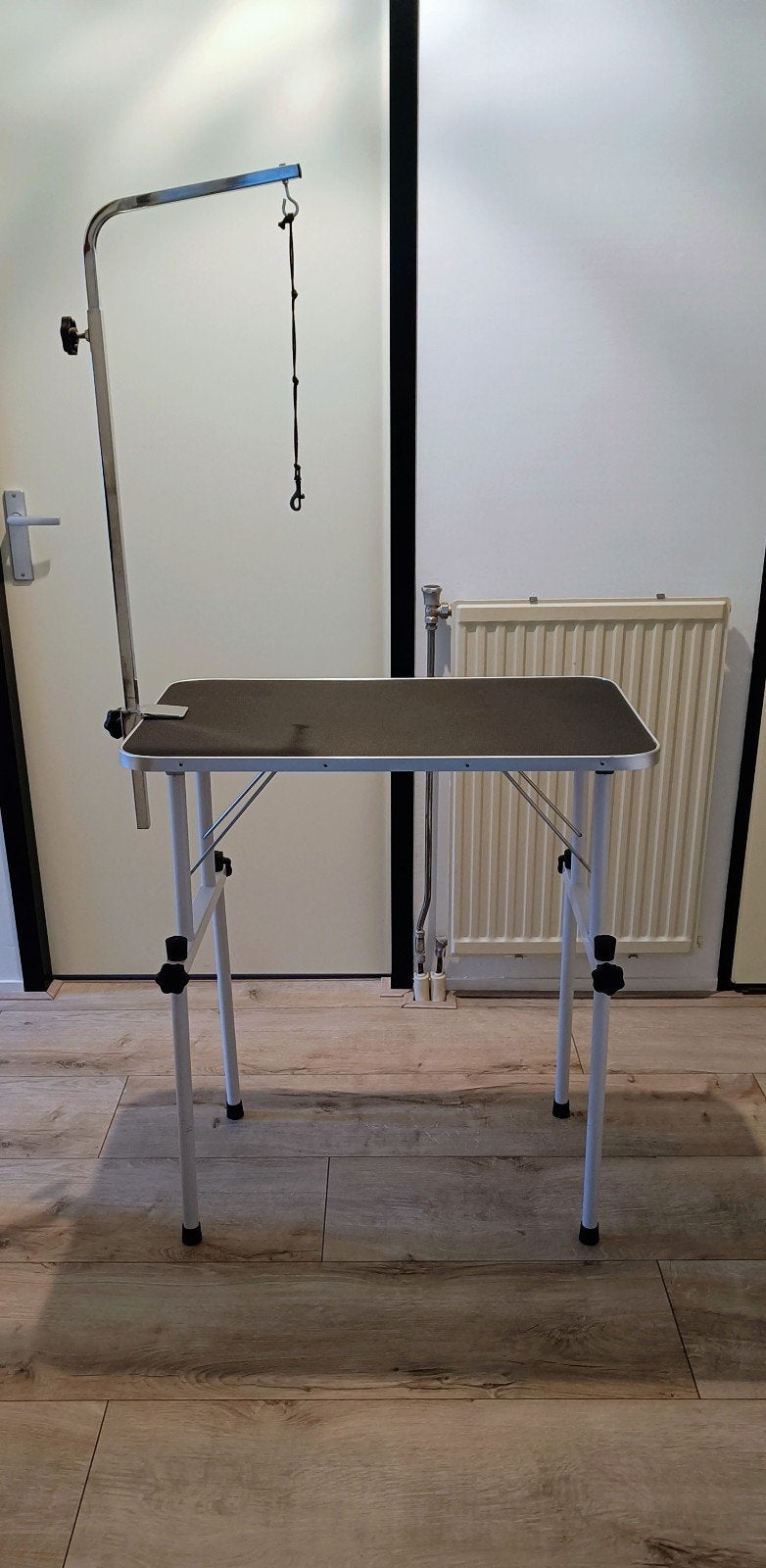 Trimtafel met beugel., Ophalen