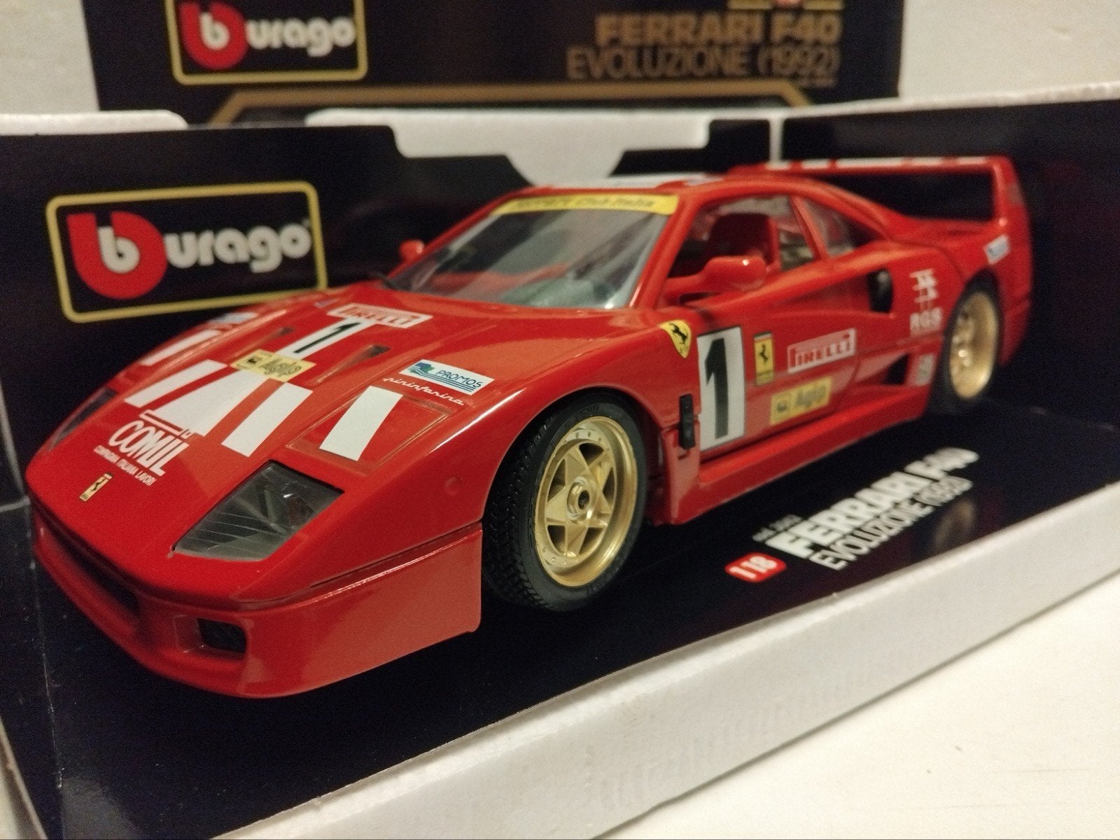 Fereari F40 Evoluzione Comil red #1 1992 Bburago 1:18 KRD, Hobby en Vrije tijd, Modelauto's | 1:18, Ophalen of Verzenden, Zo goed als nieuw