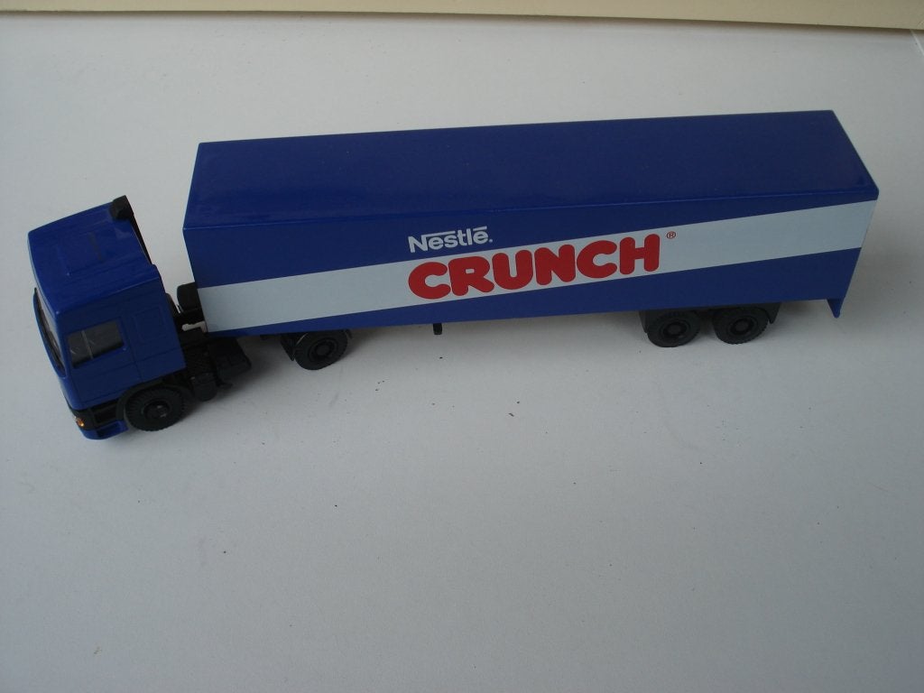 DAF trekker oplegger Nestle Crunch (Lion Toys), Verzenden, Gebruikt, Bus of Vrachtwagen, Lion Toys