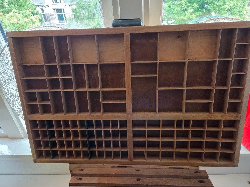 3 letterbakladen + 4 zet/werkladen, Ophalen