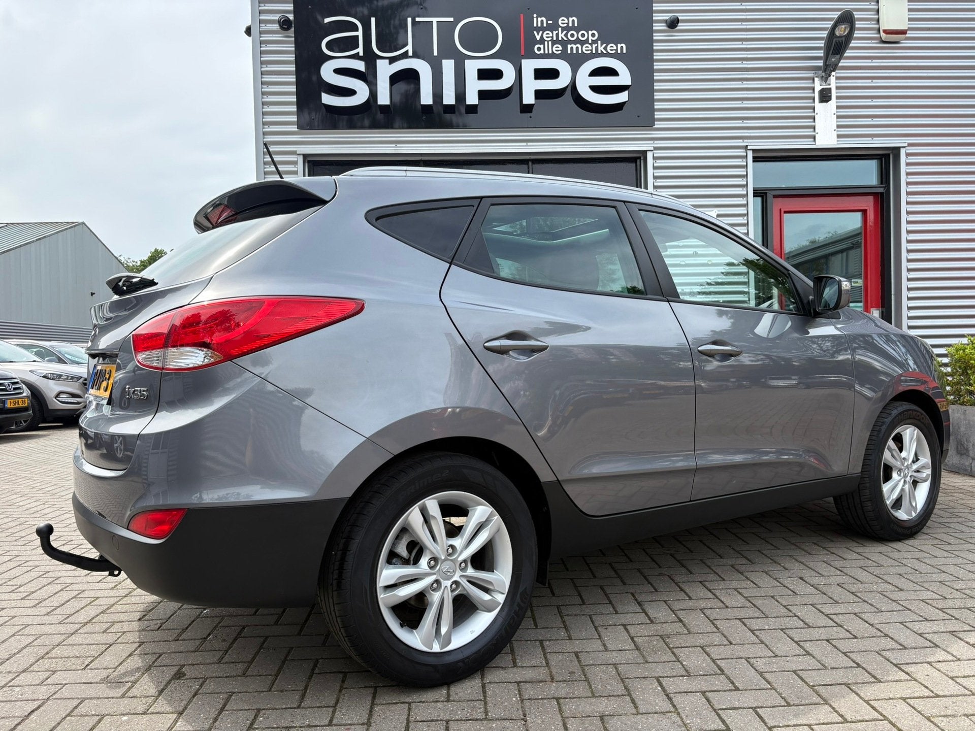 Hyundai Ix35 2.0i Business Edition -AUTOMAAT-CLIMA-CRUISE-OP, Gebruikt, Zwart, 4 cilinders, Leder en Stof