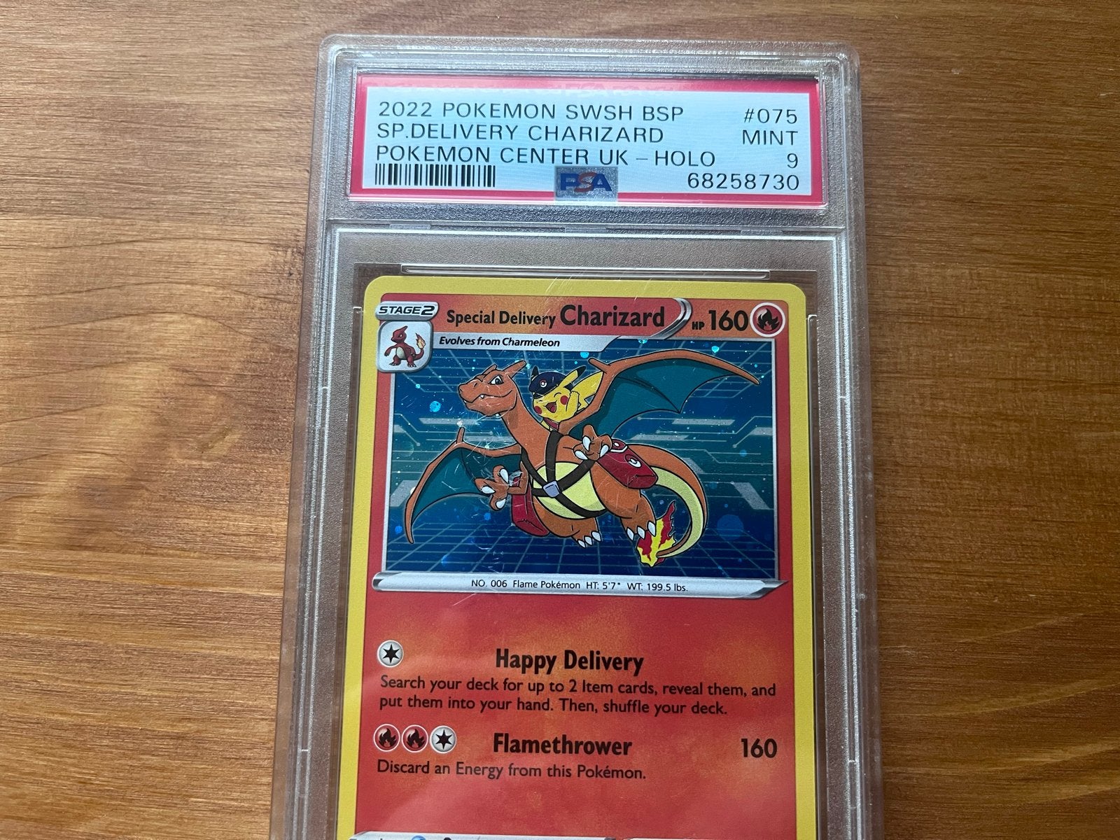 PSA 9 Special Delivery Charizard Holo Pokémon Kaart, Ophalen of Verzenden, Zo goed als nieuw, Losse kaart, Foil