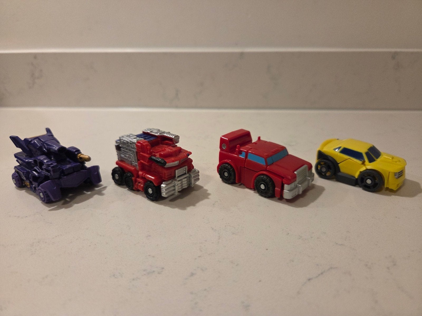 4x Transformers Bot Shots Hasbro – Optimus Bumblebee Shockwa, Verzamelen, Overige generaties, Ophalen of Verzenden, Zo goed als nieuw