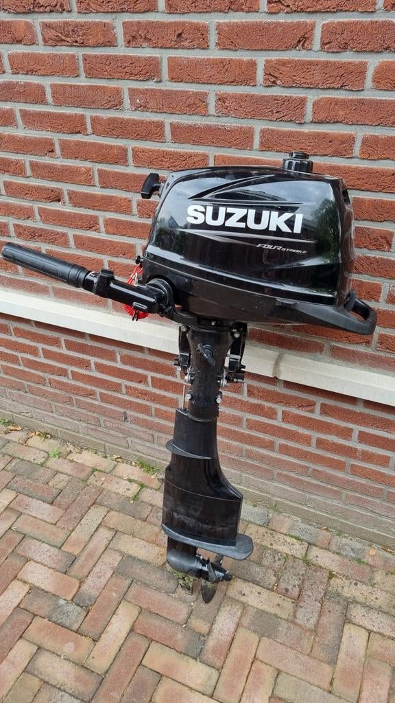 In nieuwstaat Suzuki buitenboordmotor 6pk langstaart, Ophalen, 5 tot 10 pk, Zo goed als nieuw, Buitenboordmotor