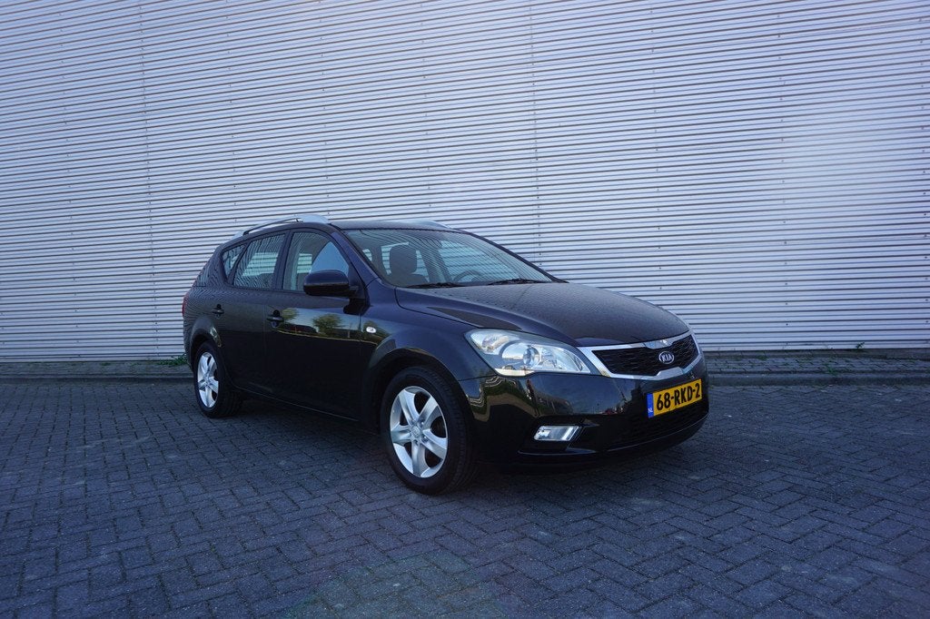 Kia cee'd Sporty Wagon 1.4 CVVT X-ecutive Airco / Navi / Cru, Auto's, Kia, Voorwielaandrijving, Euro 5, Stof, Gebruikt