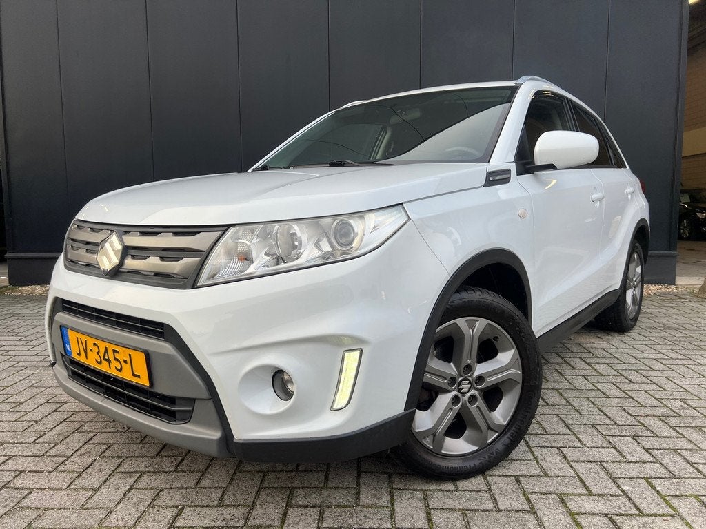 Suzuki Vitara 1.6 Exclusive '16 Clima/Lmv/Navi/Camera/Nap, Auto's, Voorwielaandrijving, Euro 6, 400 kg, Wit